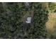 Bird's eye view of home surrounded by trees at 13080 Old Crystal River Rd, Brooksville, FL 34601