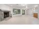 Open living space with tile floors and a view of the kitchen at 13080 Old Crystal River Rd, Brooksville, FL 34601
