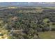 Aerial view of a large lot of land in a rural area at 13080 Old Crystal River Rd, Brooksville, FL 34601