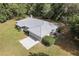 Single-story home with metal roof and large yard at 13080 Old Crystal River Rd, Brooksville, FL 34601