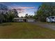 Single-story house with attached garage and large yard at 13242 Little Farms Dr, Spring Hill, FL 34609