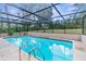 Refreshing screened pool perfect for relaxation at 13242 Little Farms Dr, Spring Hill, FL 34609