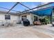 Spacious patio with seating and grill area at 13242 Little Farms Dr, Spring Hill, FL 34609