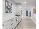 White cabinets and quartz countertops in a bright hallway at 14485 Switch Back Rd, Brooksville, FL 34609