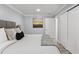 King-size bed, built in closet, and en-suite bathroom access at 14485 Switch Back Rd, Brooksville, FL 34609
