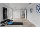 Bright home gym with equipment and access to upper floor at 14485 Switch Back Rd, Brooksville, FL 34609