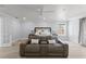 Relaxing main bedroom with comfortable seating and plenty of natural light at 14485 Switch Back Rd, Brooksville, FL 34609