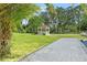 Charming gazebo with seating area and paver pathway at 14485 Switch Back Rd, Brooksville, FL 34609
