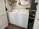 Laundry room with washer, dryer, and extra storage at 1942 Golfview Dr # 1942, Tarpon Springs, FL 34689