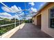 Spacious screened patio with view of the backyard at 20743 Nectarine Pl, Land O Lakes, FL 34637