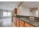 Kitchen with granite countertops and wood cabinets at 20743 Nectarine Pl, Land O Lakes, FL 34637