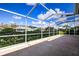 Large screened patio with backyard view at 20743 Nectarine Pl, Land O Lakes, FL 34637