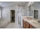 Bathroom boasts dual sinks, a shower, and a soaking tub at 20743 Nectarine Pl, Land O Lakes, FL 34637
