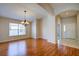 Formal dining room with hardwood floors and a chandelier at 20743 Nectarine Pl, Land O Lakes, FL 34637