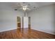 Bright bedroom with wood floors and access to bathroom at 20743 Nectarine Pl, Land O Lakes, FL 34637