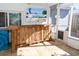 Rustic wooden bar in a screened porch at 3309 Bayport Dr, Holiday, FL 34691