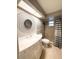 Clean bathroom with a large vanity, shower, and stylish decor at 6417 Sutherland Ave, New Port Richey, FL 34653