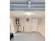Attached garage with ample storage space and laundry hookups at 6417 Sutherland Ave, New Port Richey, FL 34653