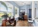 Bright home office with plenty of natural light and space for productivity at 8231 Coral Creek Loop, Hudson, FL 34667