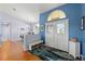 Spacious entryway with double doors and a view to the dining room at 8231 Coral Creek Loop, Hudson, FL 34667