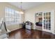 Home office with hardwood floors and built-in desk at 1931 Sassafras Dr, Wesley Chapel, FL 33543
