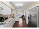 Kitchen boasts stainless steel appliances and granite countertops at 1931 Sassafras Dr, Wesley Chapel, FL 33543