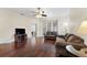 Spacious living room with hardwood floors and a comfortable sofa at 1931 Sassafras Dr, Wesley Chapel, FL 33543