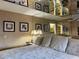 Bright bedroom with mirrored ceiling and a comfortable bed at 20857 Haulover Cv # B-13, Lutz, FL 33558