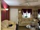 Living room with beige couches and a view of the entrance at 20857 Haulover Cv # B-13, Lutz, FL 33558