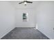 Bright bedroom with ceiling fan and natural light at 2293 Dog Leg Ct, Brooksville, FL 34604