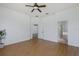 Bright bedroom with wood floors and access to an en-suite bathroom at 2293 Dog Leg Ct, Brooksville, FL 34604