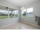 Bright breakfast nook with large windows and view to backyard at 2293 Dog Leg Ct, Brooksville, FL 34604