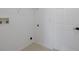 Bright laundry room with washer and dryer hookups, and ample space for storage at 2293 Dog Leg Ct, Brooksville, FL 34604