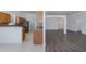 Open floorplan view of the kitchen and living area featuring modern finishes at 2293 Dog Leg Ct, Brooksville, FL 34604