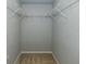 Walk-in closet with wire shelving; ready for organization at 2293 Dog Leg Ct, Brooksville, FL 34604