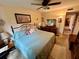 Spacious bedroom with king-size bed and dresser at 427 Windrush Bay Dr # 427, Tarpon Springs, FL 34689