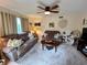 Spacious living room featuring two sofas and a coffee table at 427 Windrush Bay Dr # 427, Tarpon Springs, FL 34689