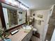 Bathroom with vanity, large mirror, and shower/tub at 427 Windrush Bay Dr # 427, Tarpon Springs, FL 34689