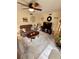 Bright living room with comfy sofas, coffee table, and large TV at 427 Windrush Bay Dr # 427, Tarpon Springs, FL 34689