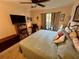 Bedroom with king-size bed and TV at 427 Windrush Bay Dr # 427, Tarpon Springs, FL 34689