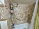 Shower/tub combo with tiled walls at 427 Windrush Bay Dr # 427, Tarpon Springs, FL 34689