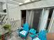 Private patio with seating area and access to interior at 427 Windrush Bay Dr # 427, Tarpon Springs, FL 34689