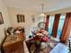 Cozy dining area with table and chairs, near sliding doors at 427 Windrush Bay Dr # 427, Tarpon Springs, FL 34689