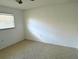 This room features tile flooring and a window with mini blinds that allows for ample sunlight at 4913 Hazner St # 4913, New Port Richey, FL 34652