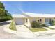 Ranch style home with attached garage and well-manicured lawn at 4913 Hazner St # 4913, New Port Richey, FL 34652