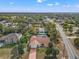 Aerial view of the property and surrounding neighborhood at 6450 Trade Ct, Spring Hill, FL 34606