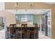 Kitchen with breakfast bar, stainless steel appliances, and blue cabinets at 6450 Trade Ct, Spring Hill, FL 34606