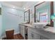 Modern bathroom with double vanity and granite countertops at 6450 Trade Ct, Spring Hill, FL 34606
