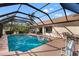 Enjoy this large, refreshing pool with screened enclosure at 6450 Trade Ct, Spring Hill, FL 34606