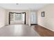 Living room with tile floor and bay window at 6489 Pine Meadows Dr, Spring Hill, FL 34606